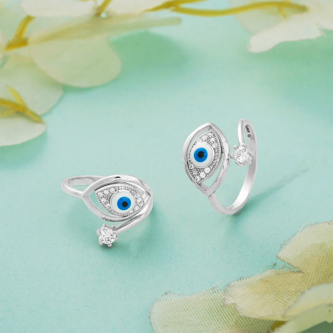 Silver evil eye toe rings with blue eye design