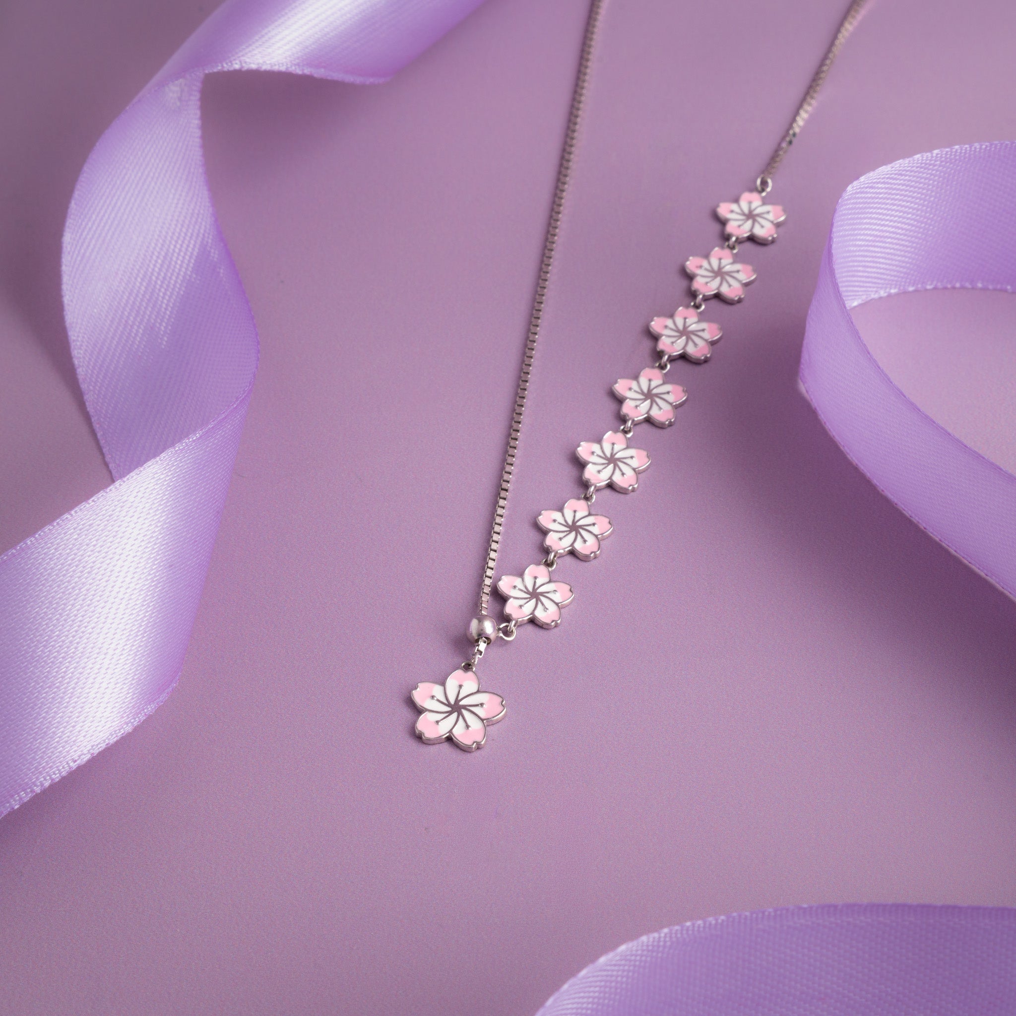 Silver floral necklace with pink enamel blossom charms