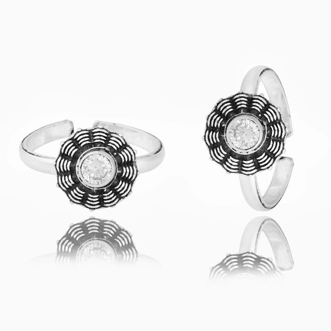Silver floral toe ring with oxidised detailing  