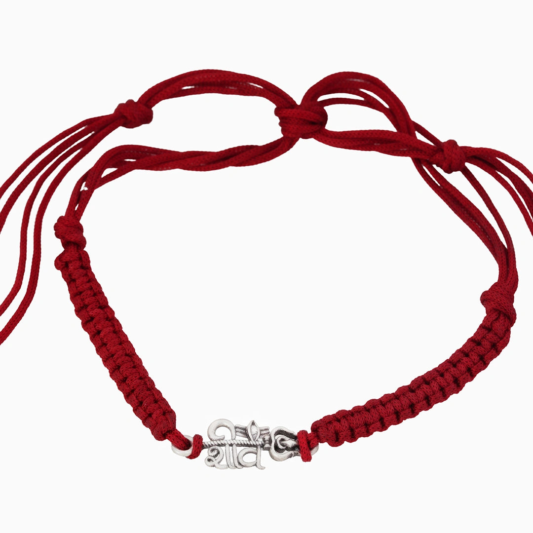 Silver rakhi with trishul damru motif Ishna