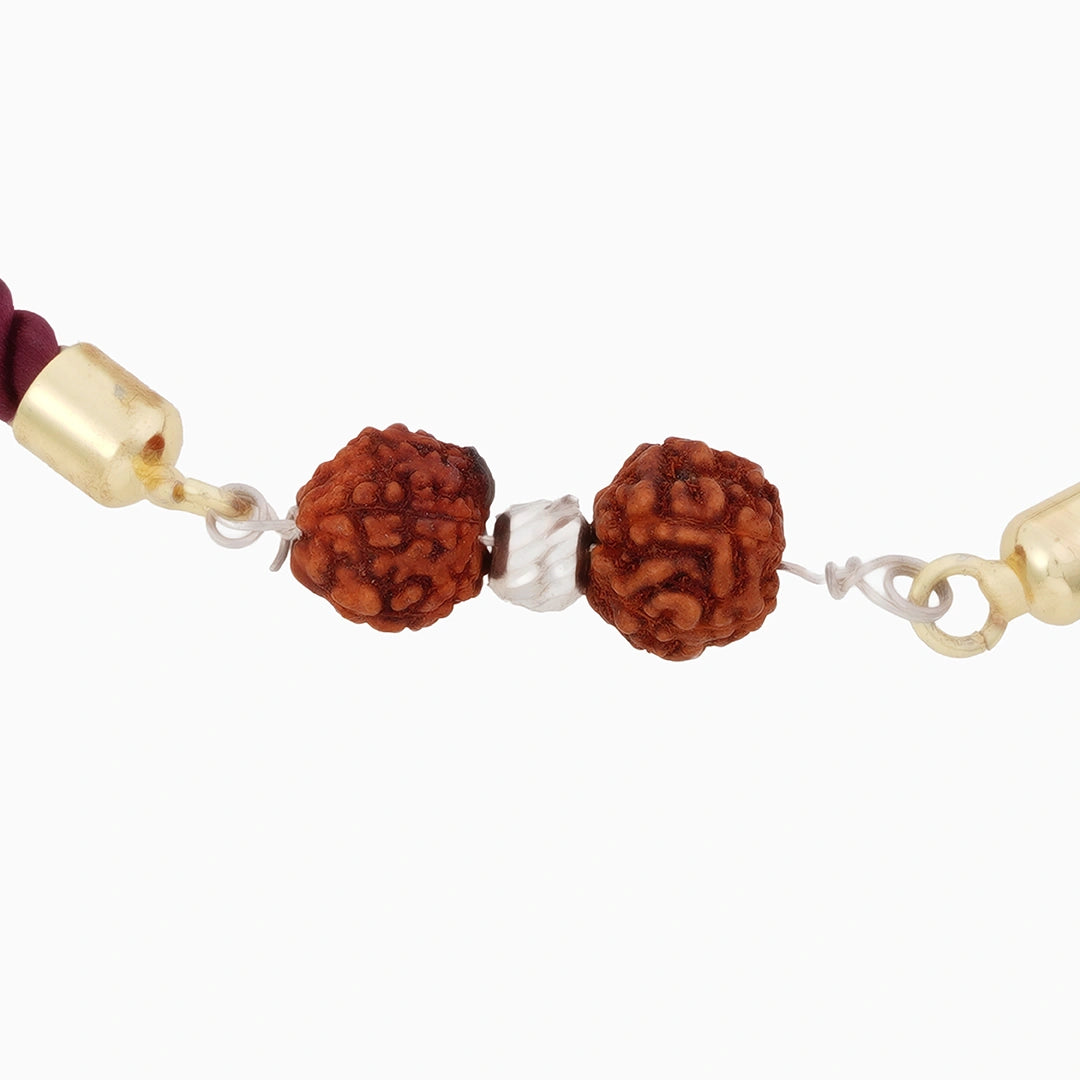 Silver rudraksha rakhi designed Ishna