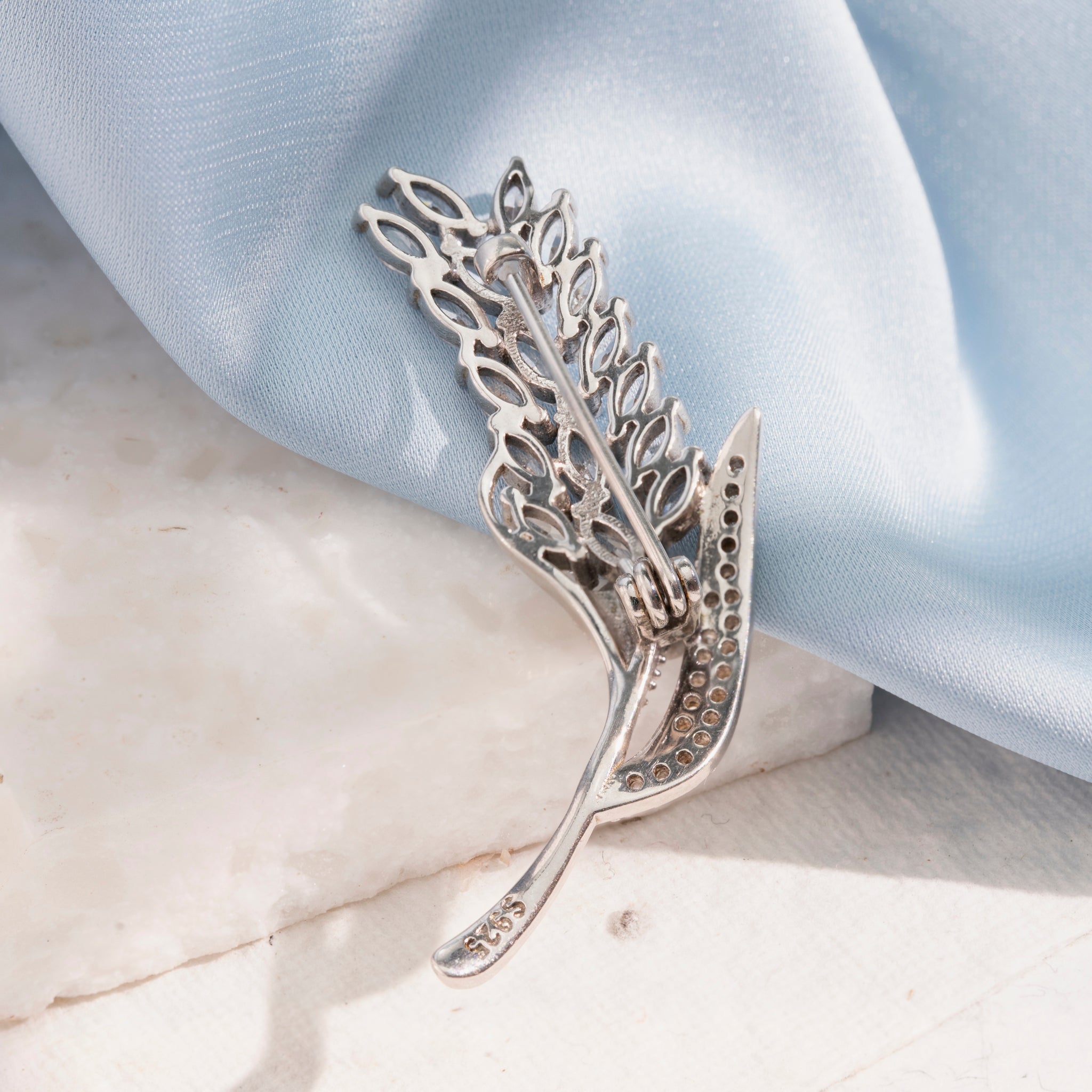 Silver wheat ear brooch with stones