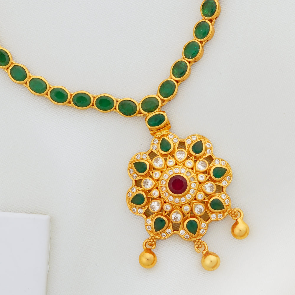South Indian green stone necklace with gold-plated floral charm