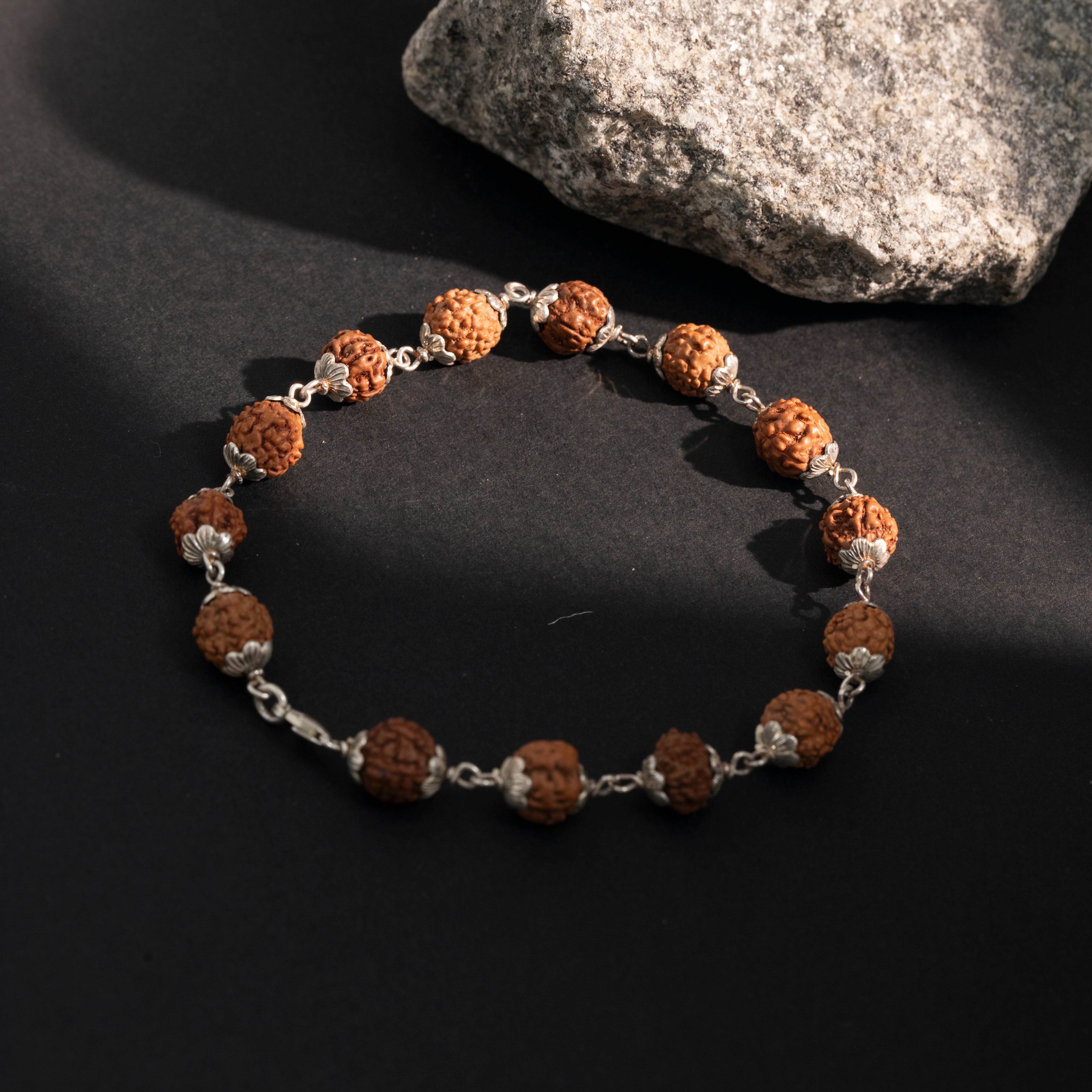 Spiritual rudraksha bracelet with silver links