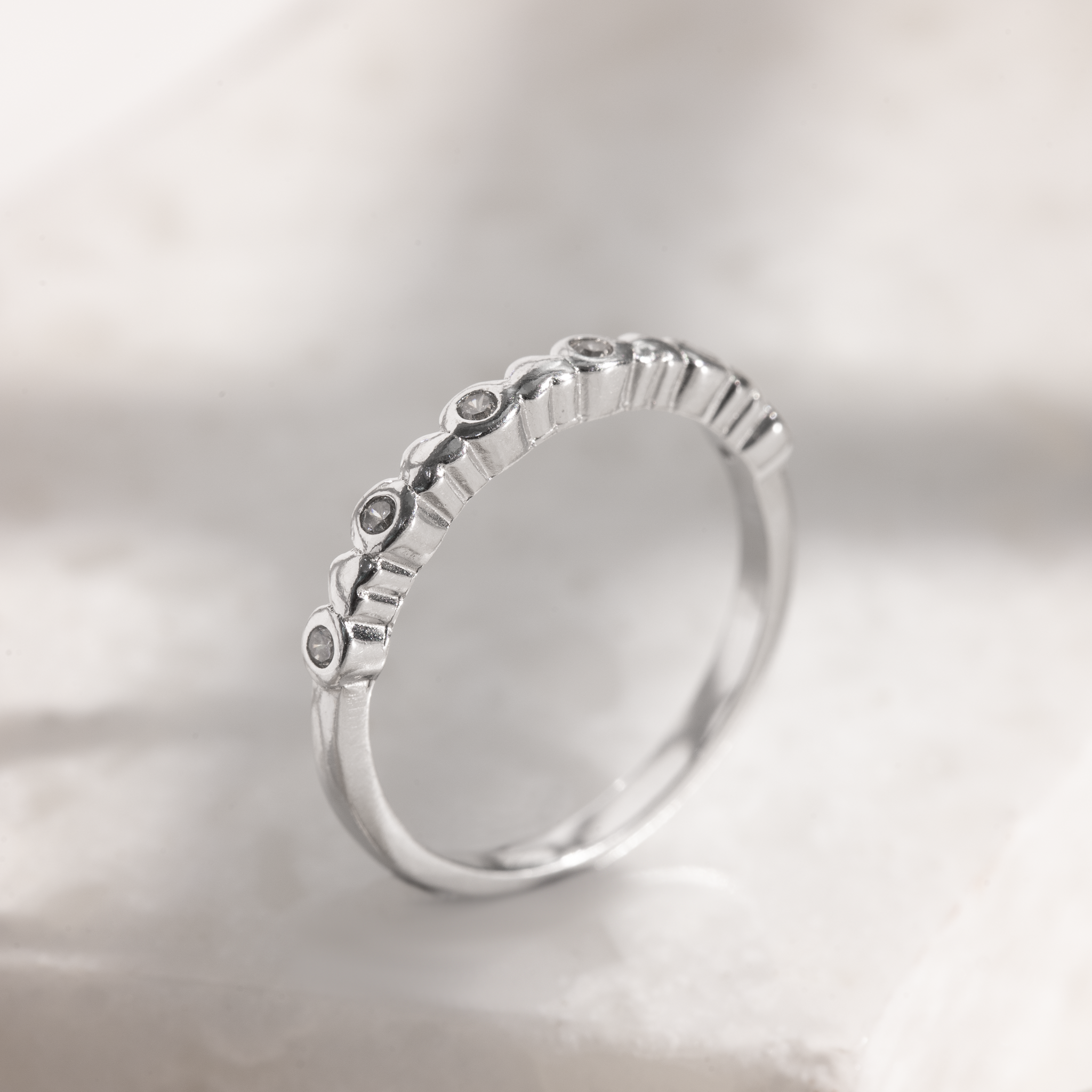 Stackable beaded silver ring modern design