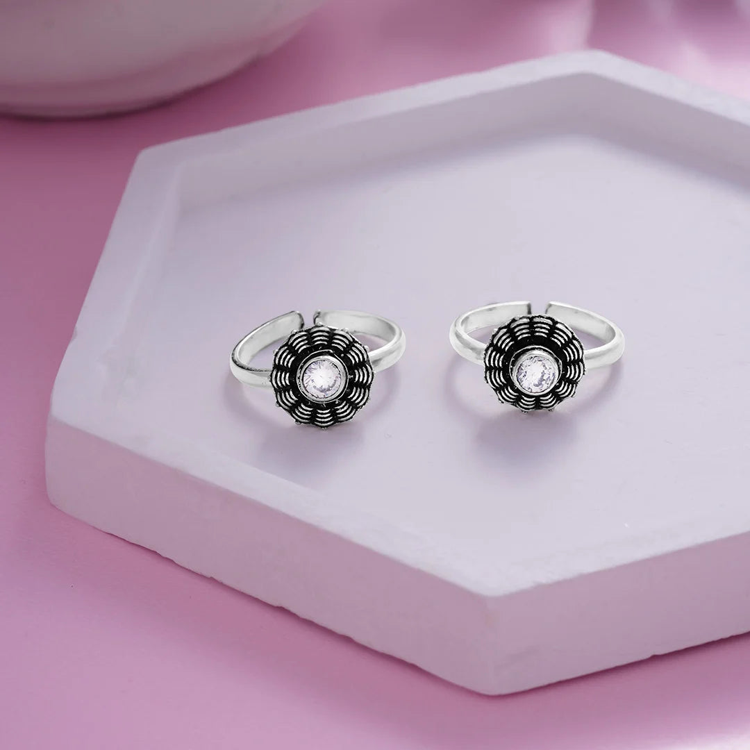 Sterling Silver floral toe ring with oxidised detailing  