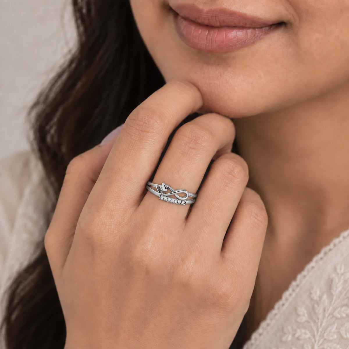 Sterling Silver infinity design ring with crystals