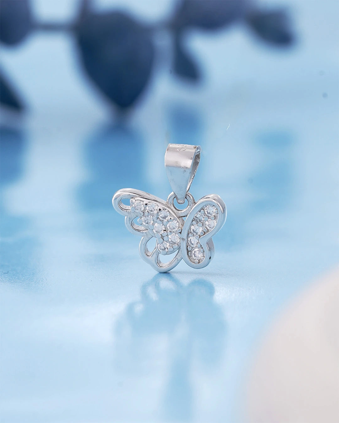 Sterling silver butterfly pendant with stones