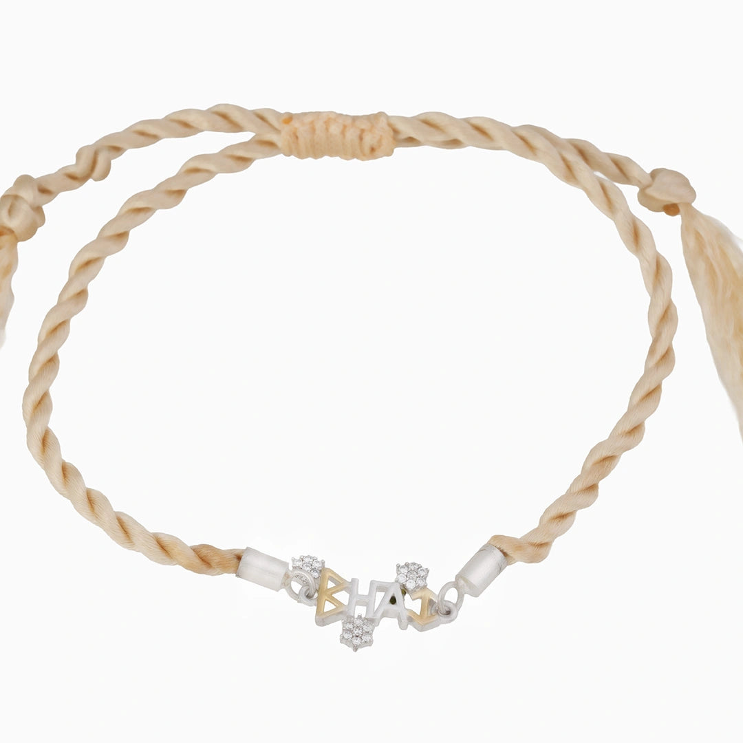 Sterling silver golden thread rakhi Ishna