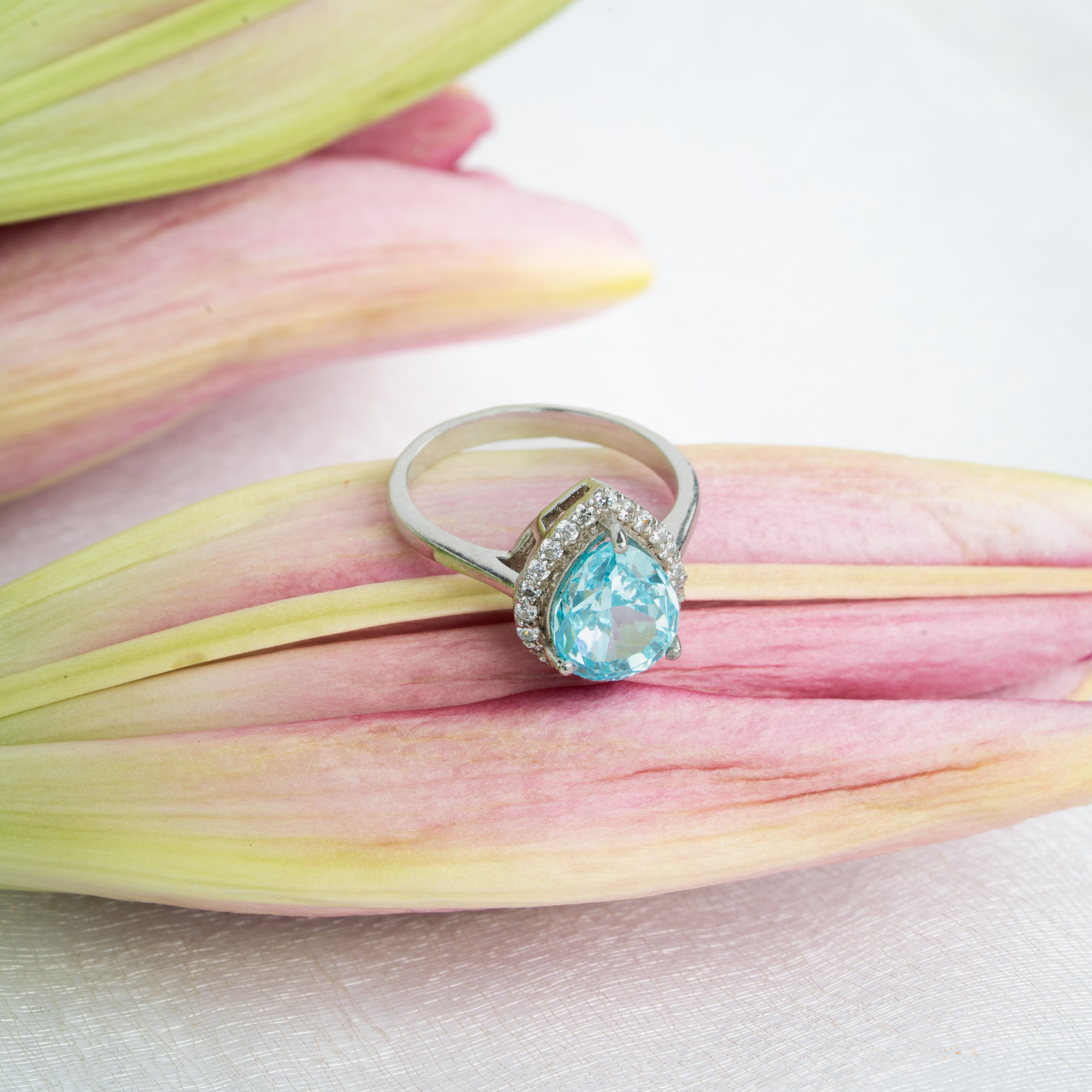 Sterling silver pear-shaped aqua blue stone ring