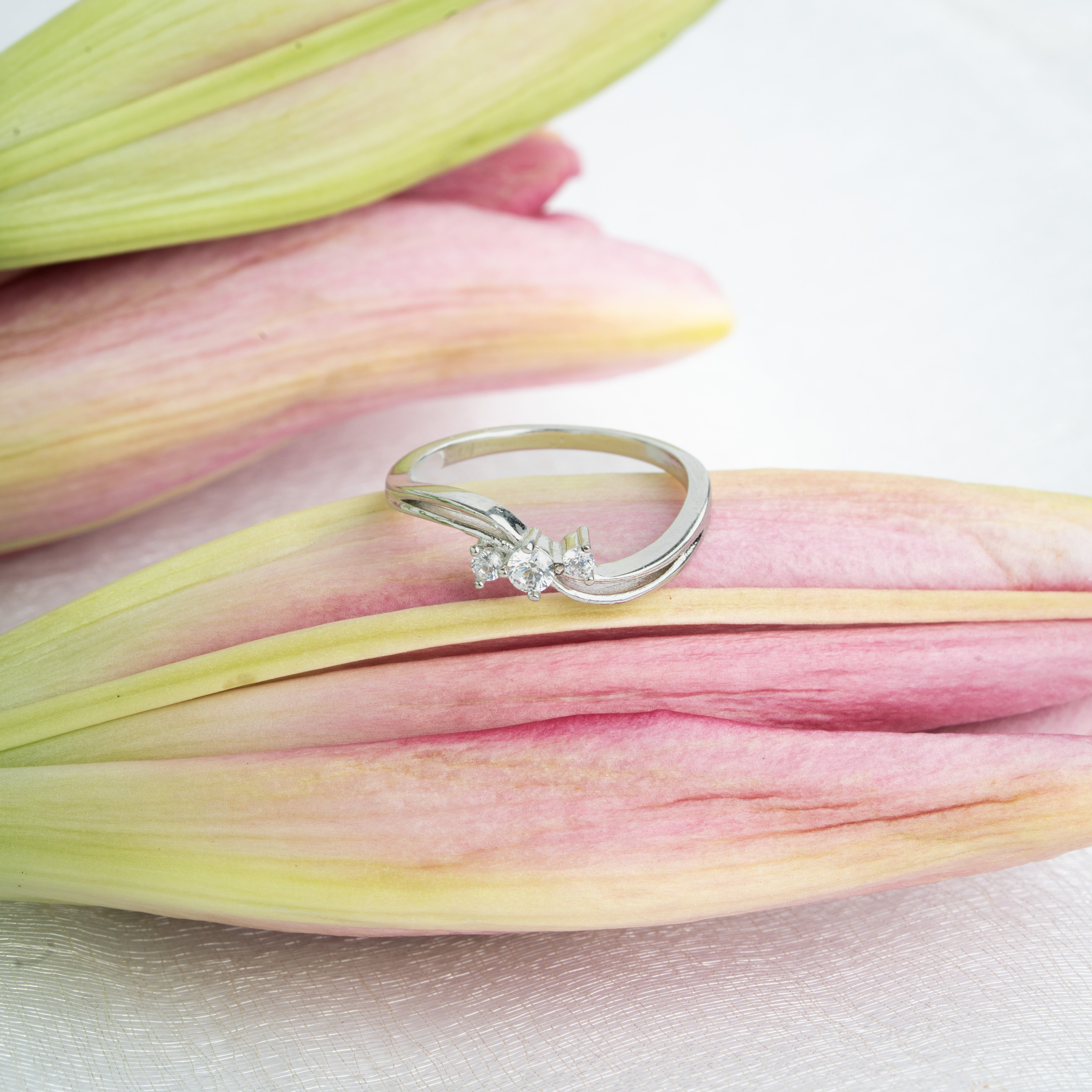 Sterling silver three-stone wave design ring