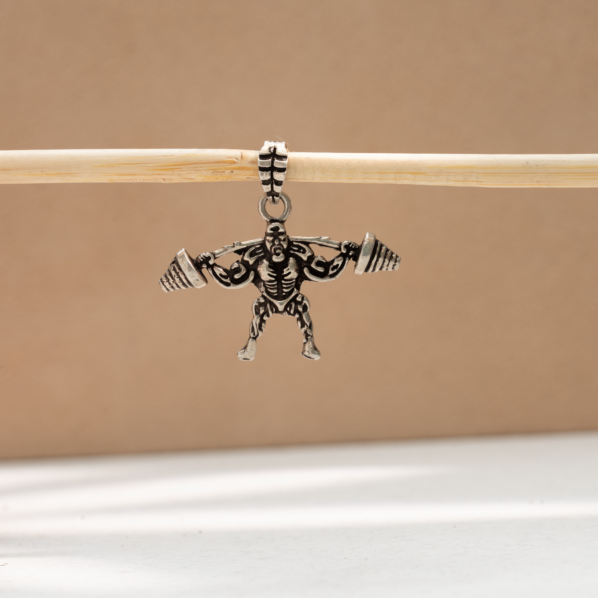 Sterling silver weightlifter pendant