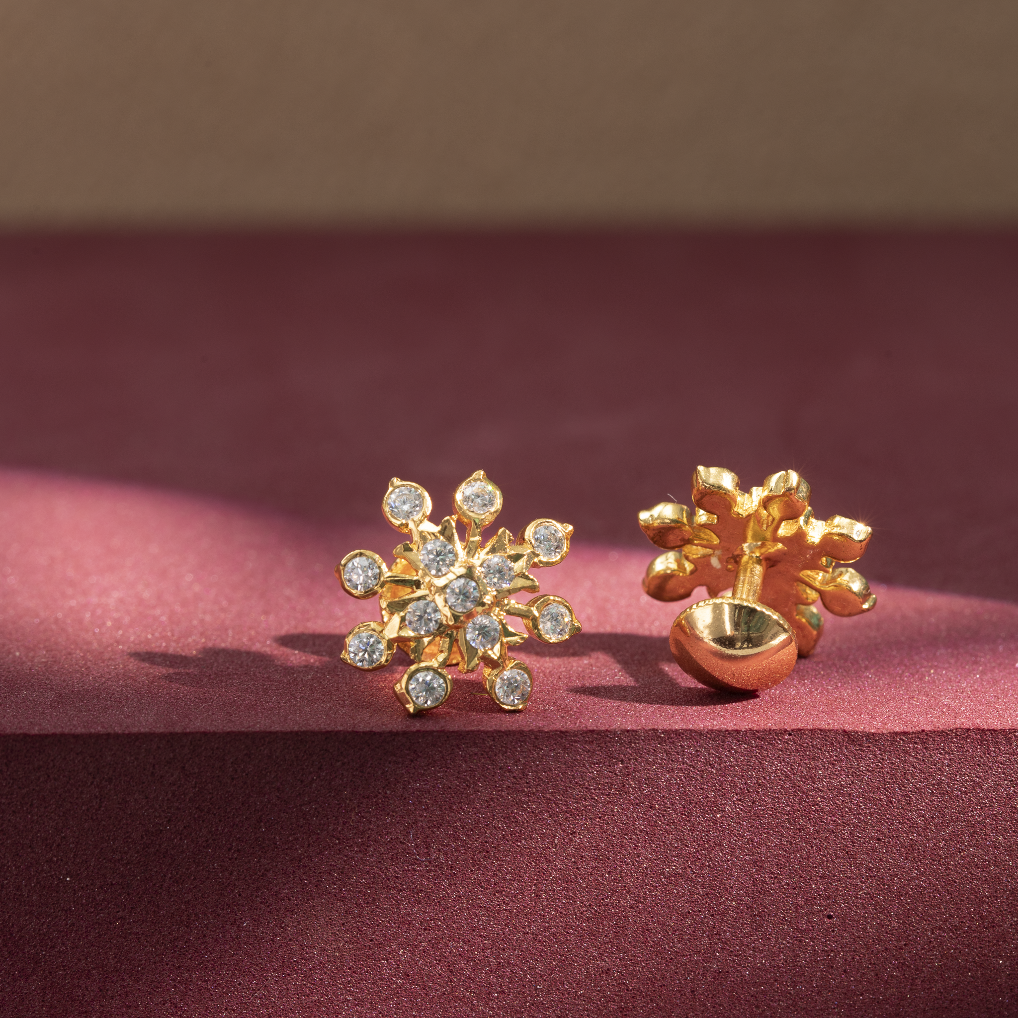 Stone stud flower design earrings