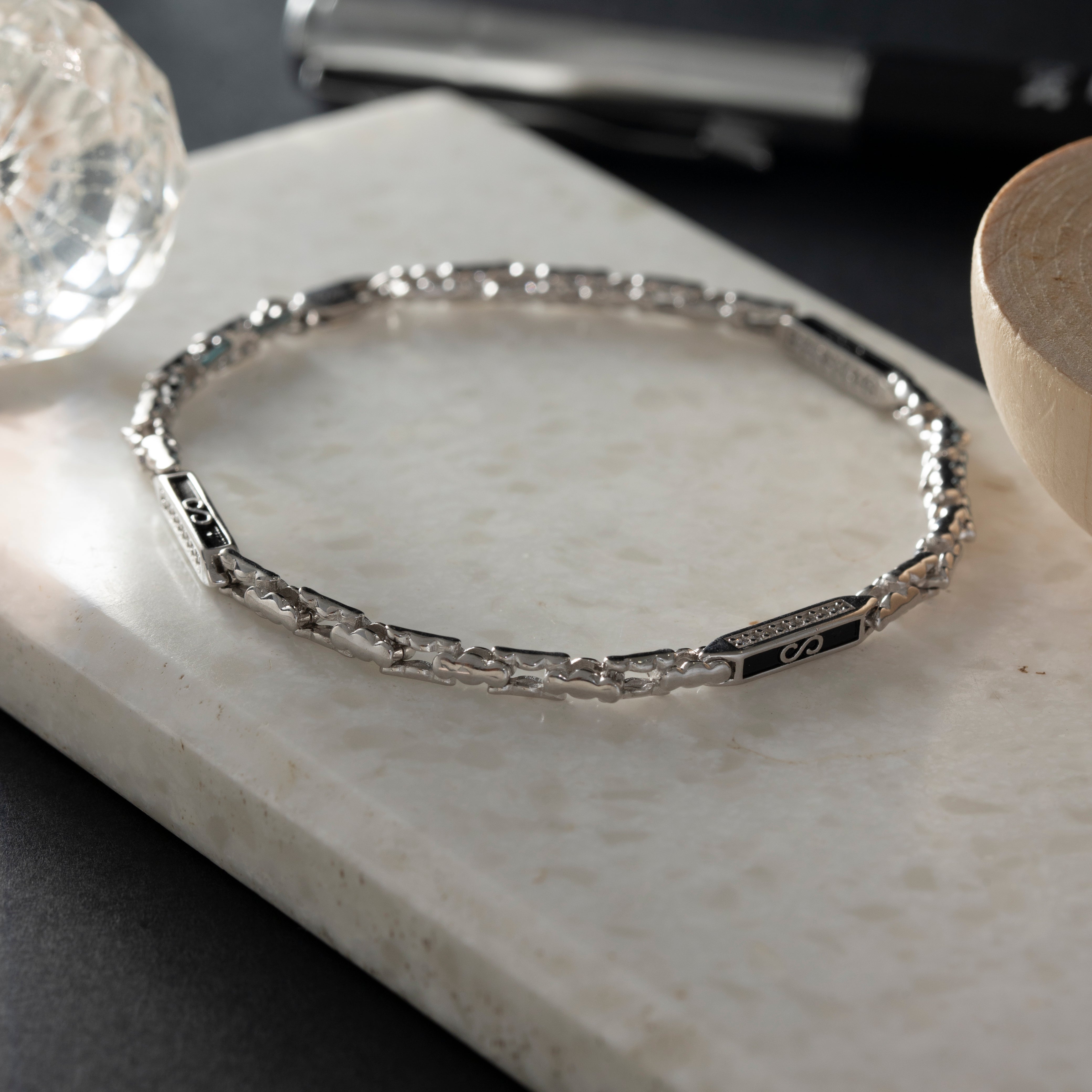 Symbolic infinity silver bracelet