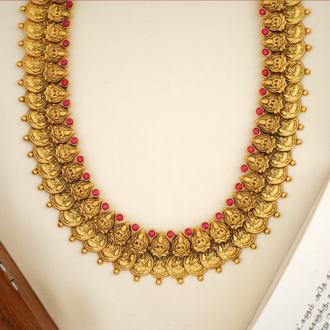Temple jewellery haram with ruby accents and Lakshmi coins