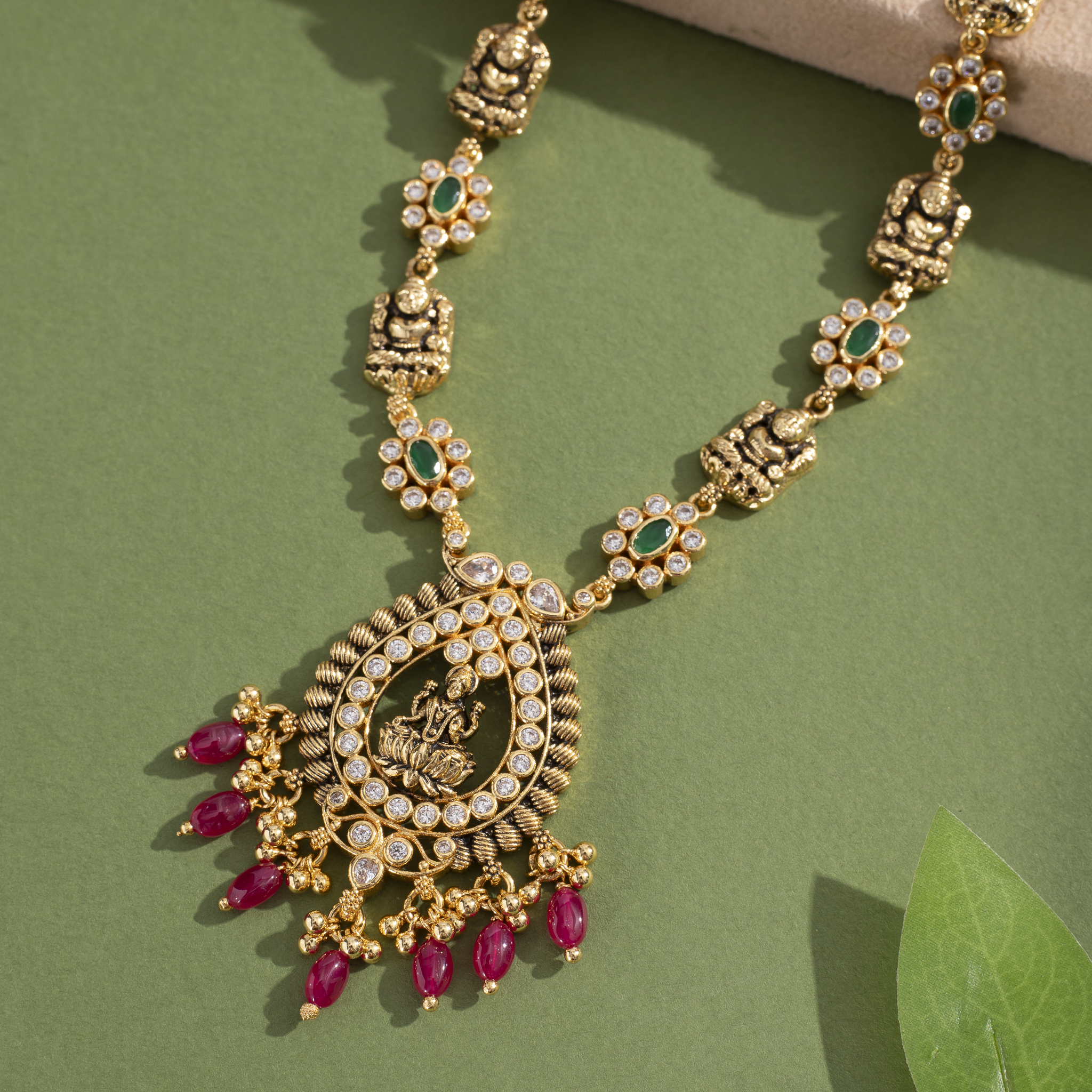 Temple jewellery necklace with ruby drops