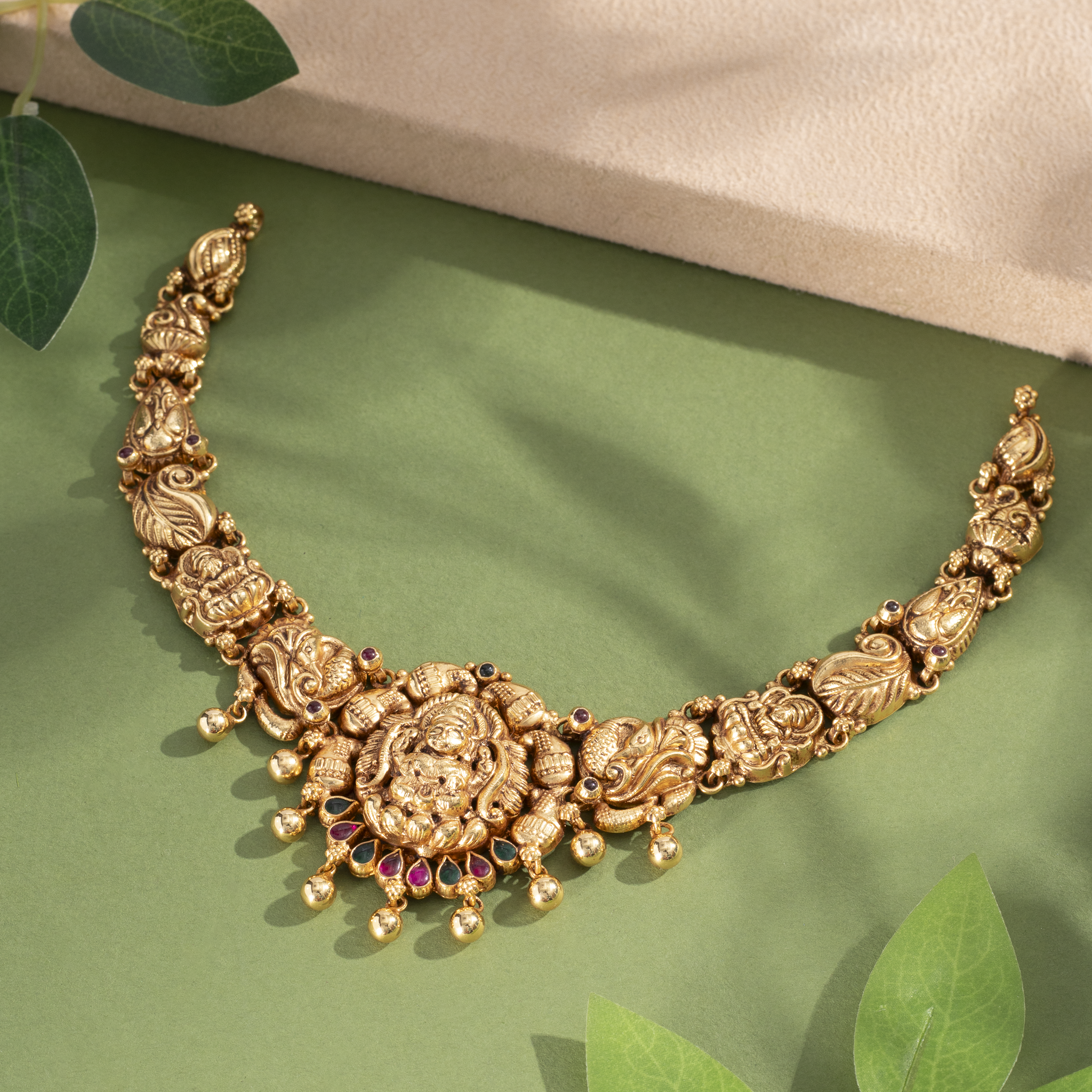 Temple style gold plated necklace