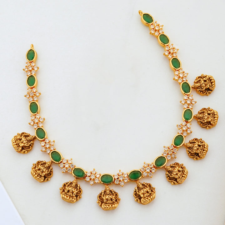 Traditional Gold plated Finish Necklace Set with Emerald and Lakshmi Design