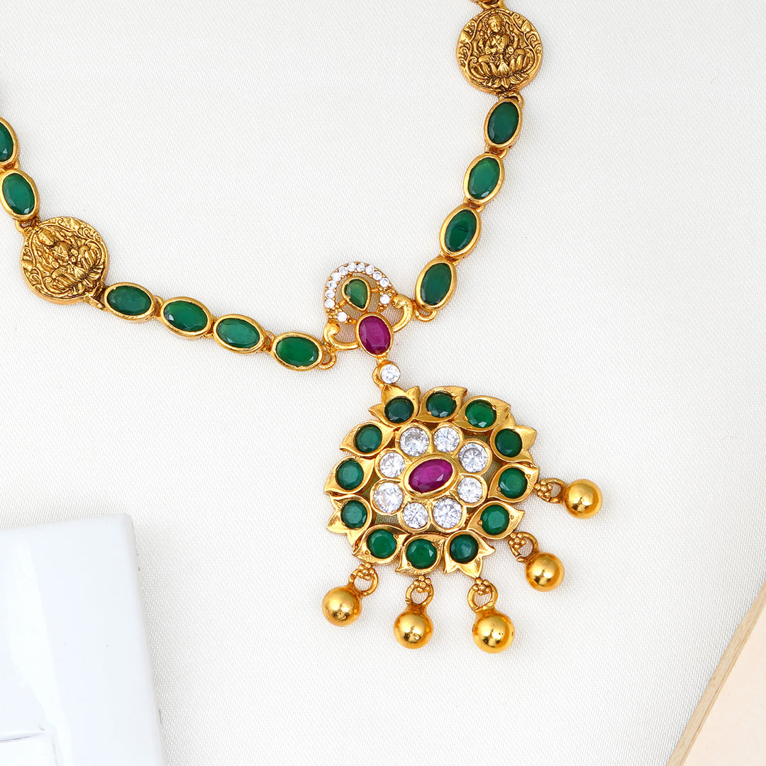 Traditional Lakshmi pendant necklace with emerald gems