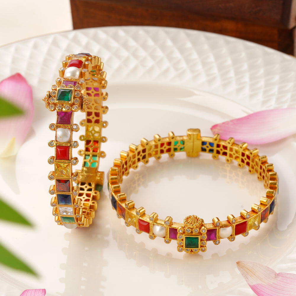 Traditional Navaratna gemstone bangle with pearls and ruby design