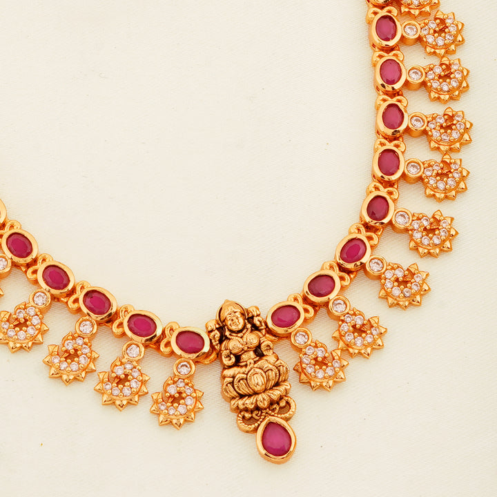 Traditional gold plated necklace with Lakshmi motif and pearl drops