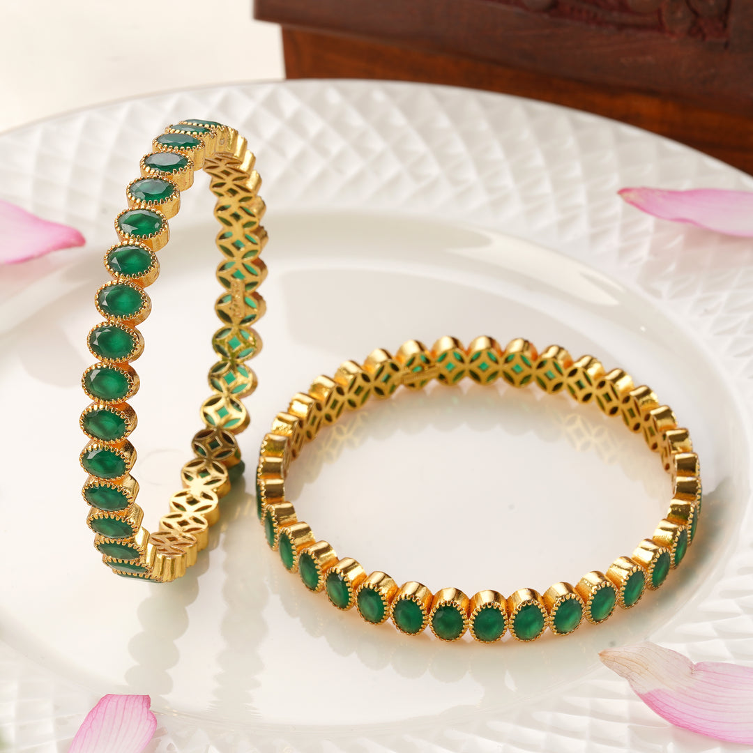 Traditional green stone bangles in antique gold finish