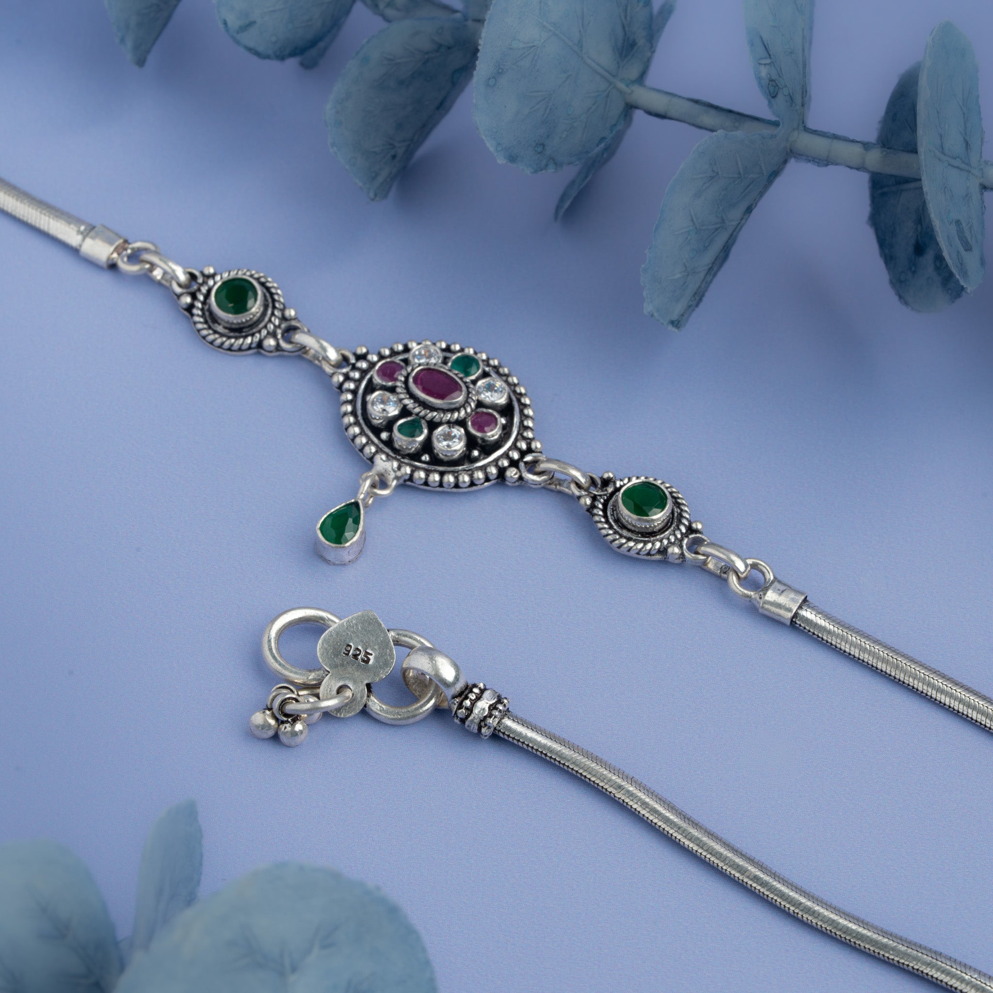 Traditional silver anklet with circular gemstone