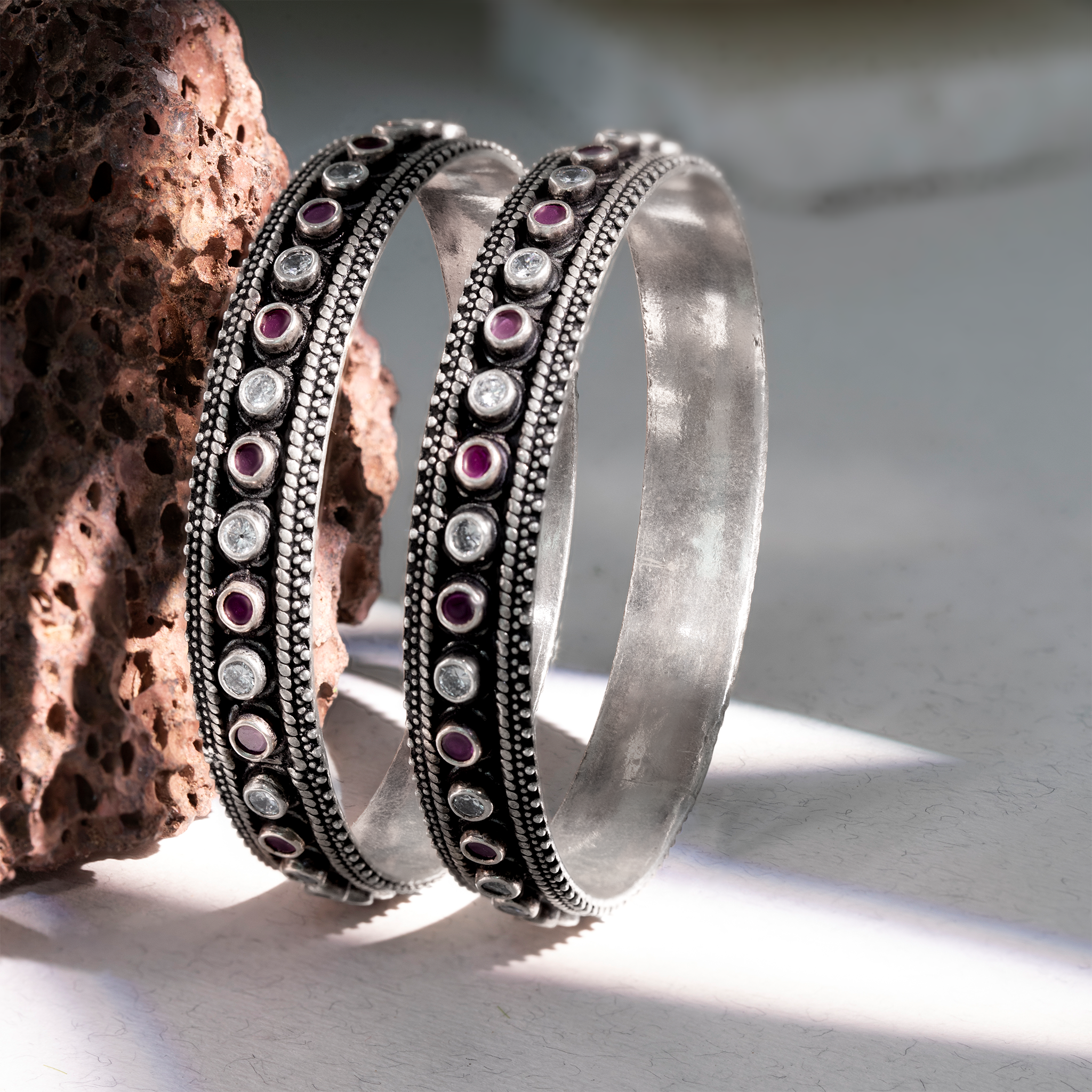 Traditional silver bangle with white stones