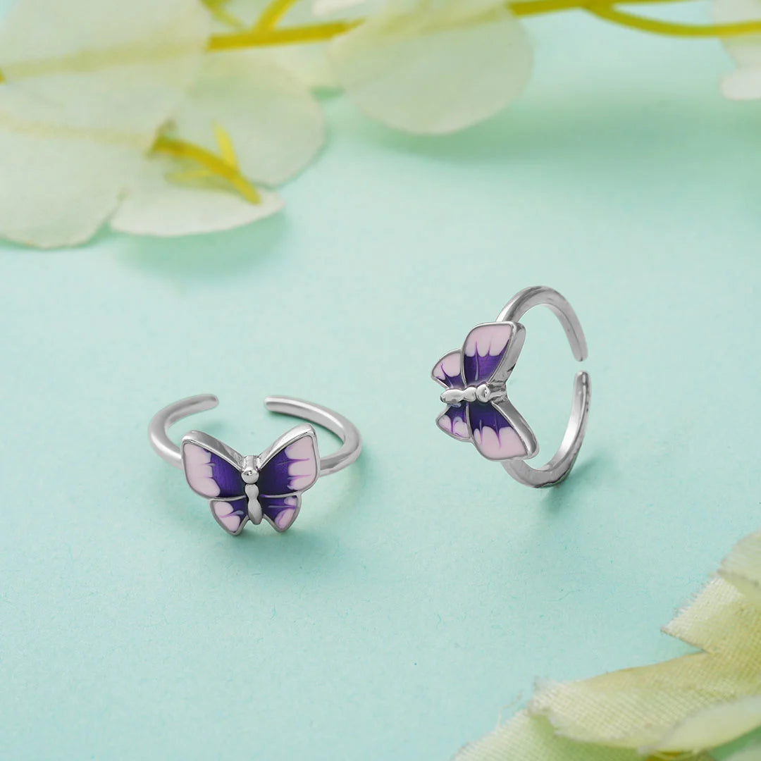 Two-tone butterfly metti pair in silver 