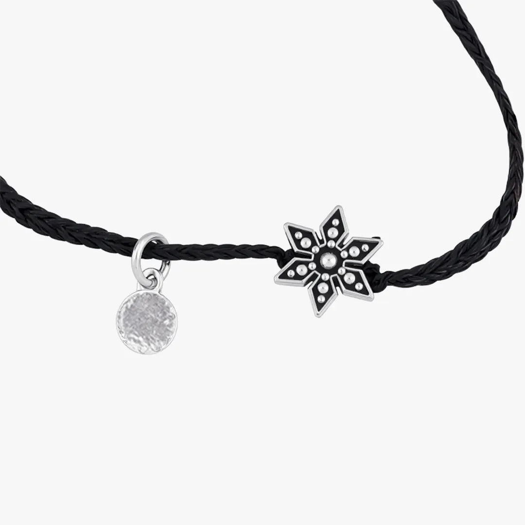 black thread bracelet with silver flower charm