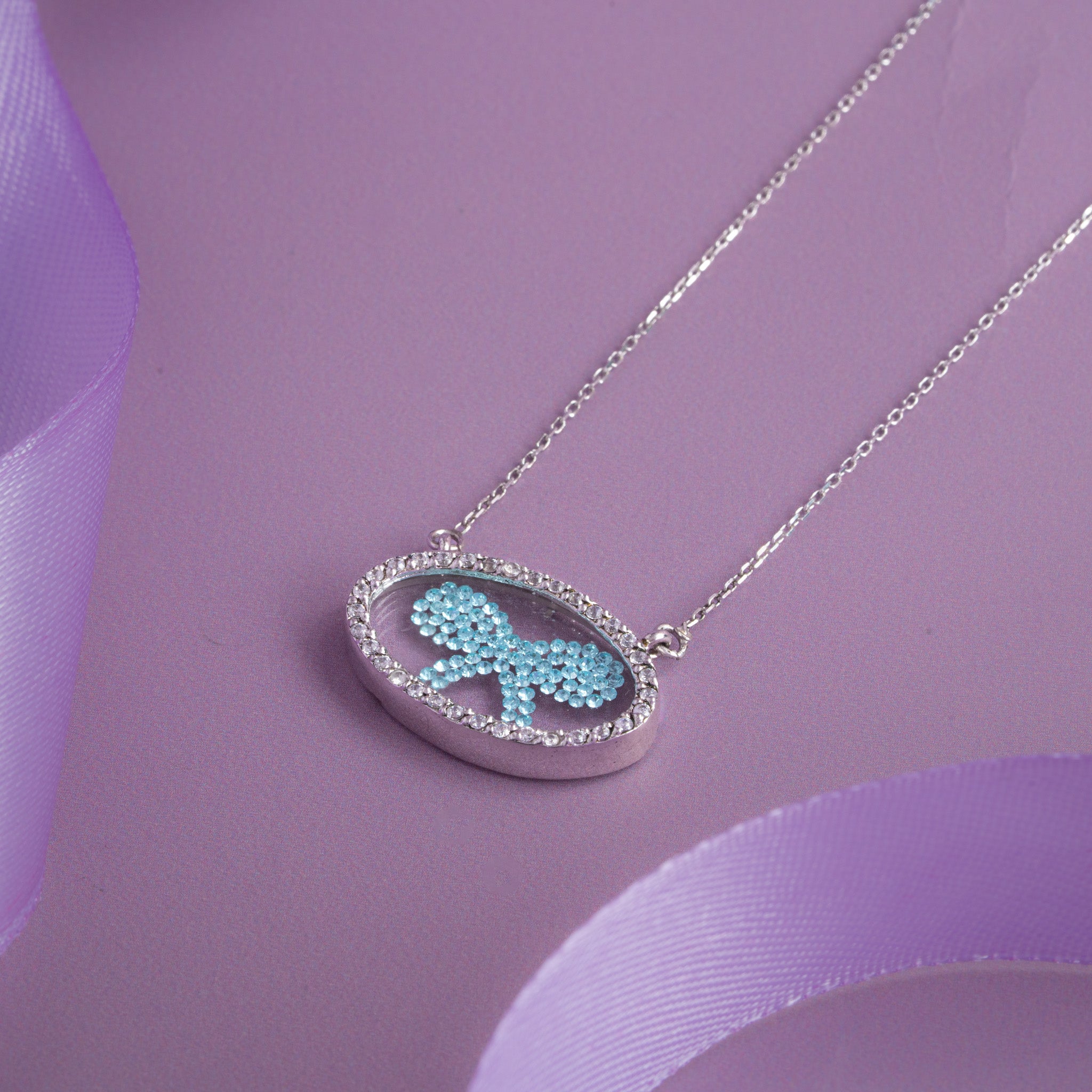 bow pendant silver chain