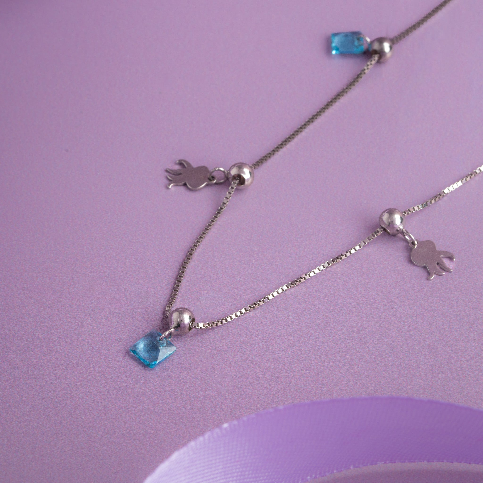 charm chain with blue crystal drops
