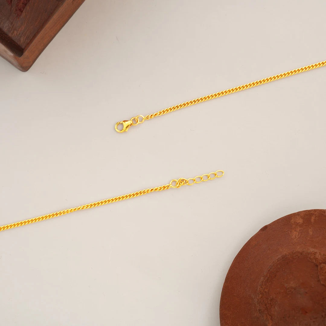 gold plated anklet with floral motif