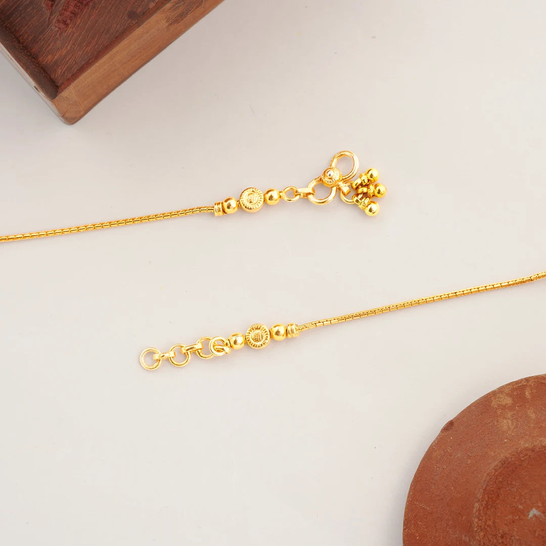 gold plated anklet with lotus design