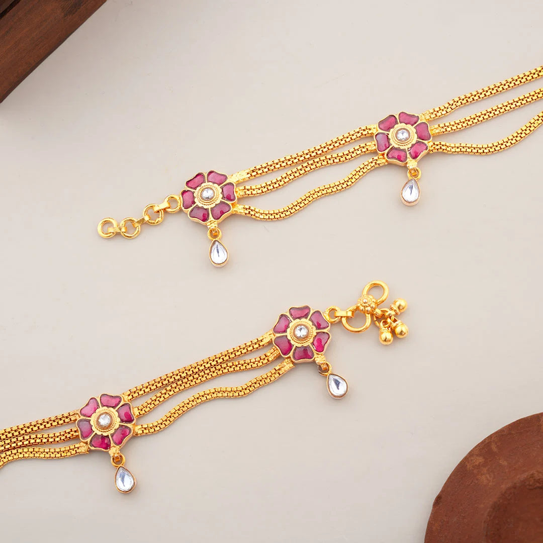 gold plated anklet with pink flower design