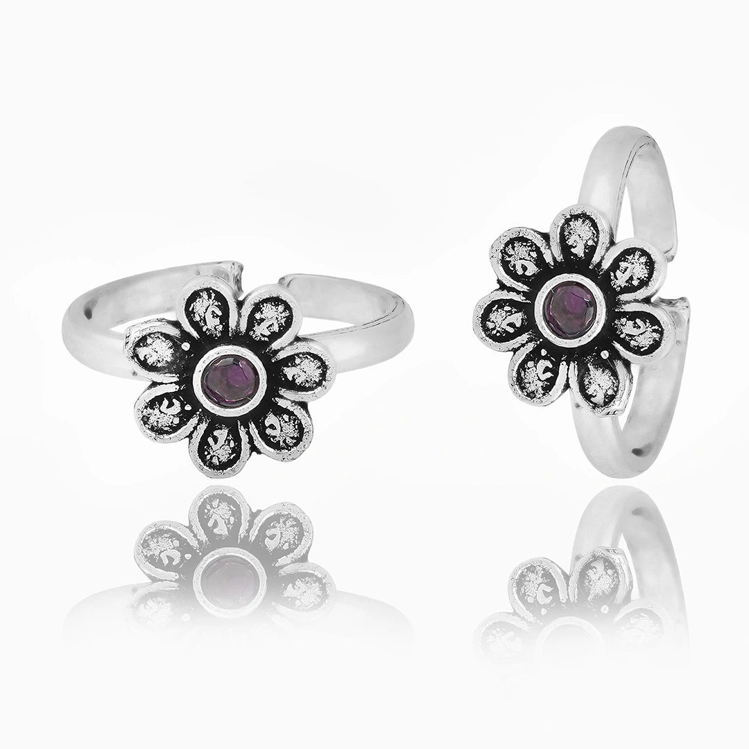 oxidised floral detailing with purple centre stone  