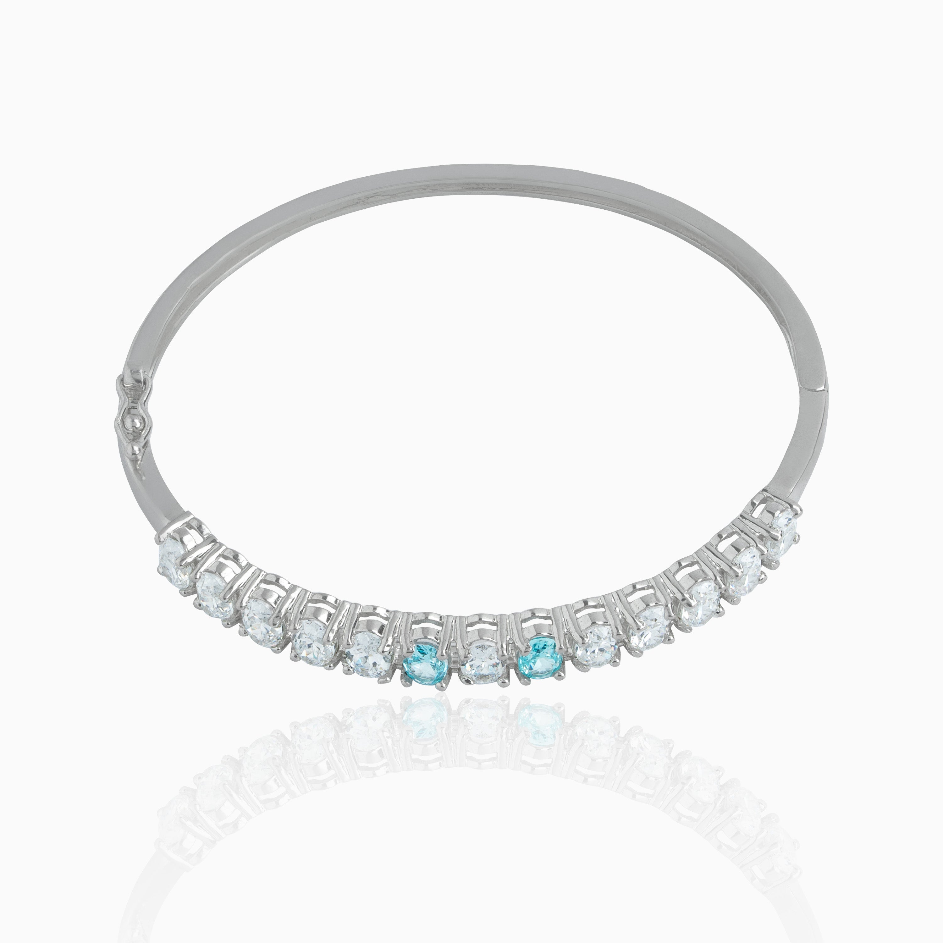 silver bangle with blue stones design