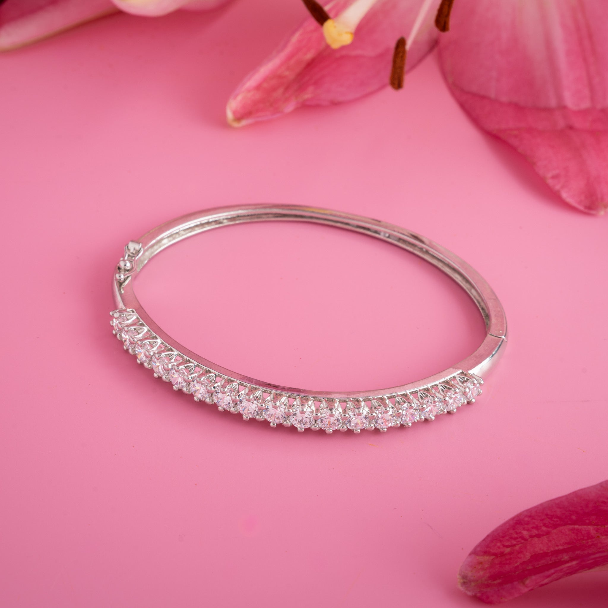 silver kada bracelet with sparkling stones
