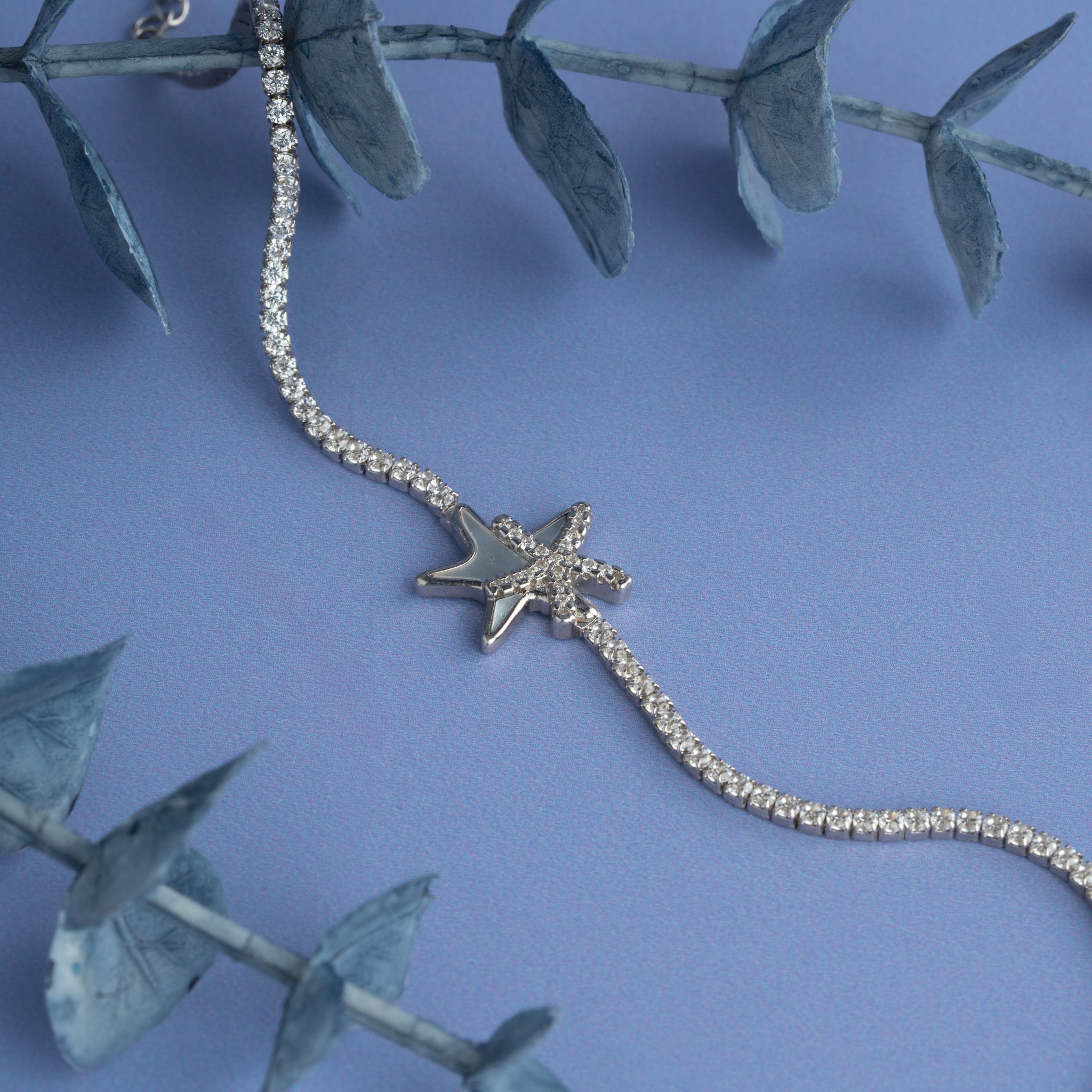 silver starfish bracelet with stones