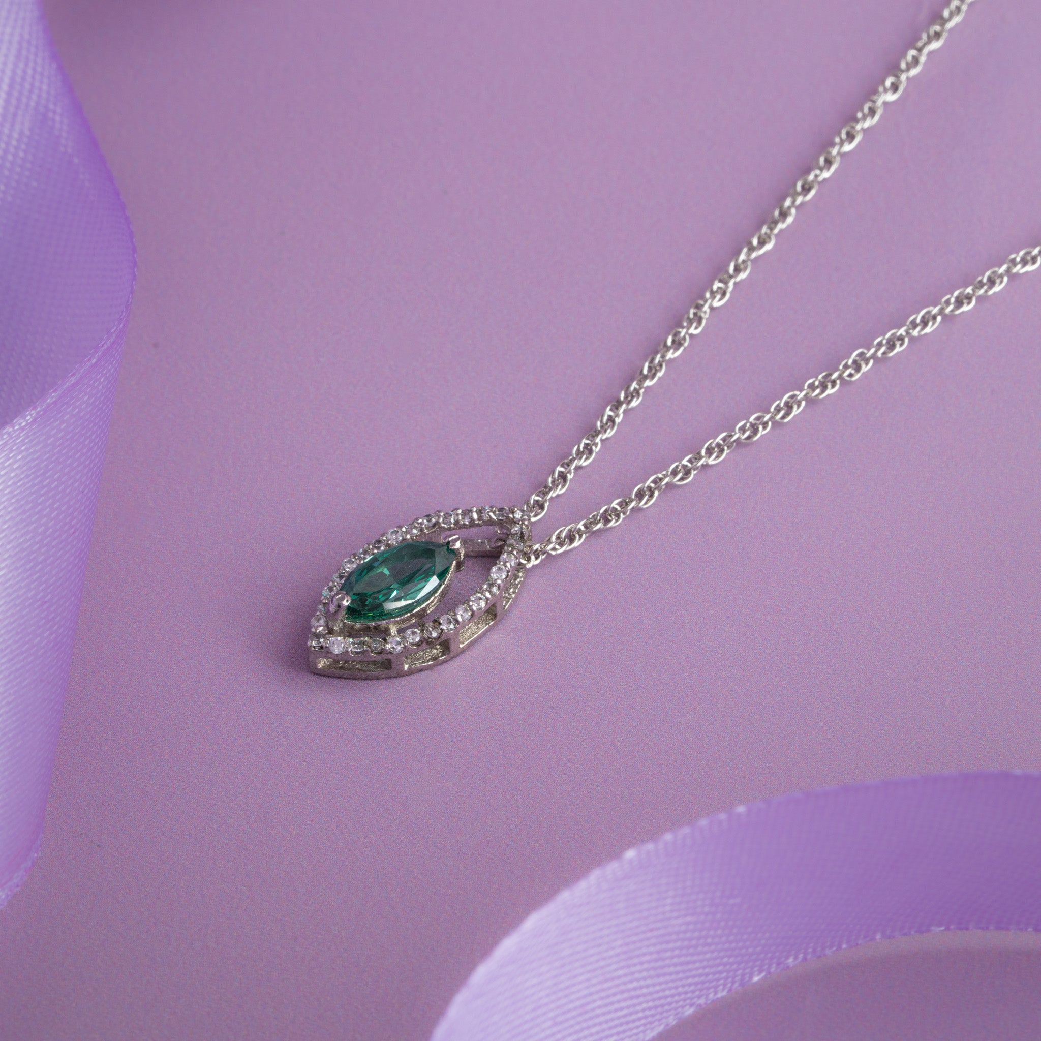 teardrop pendant chain with green gemstone