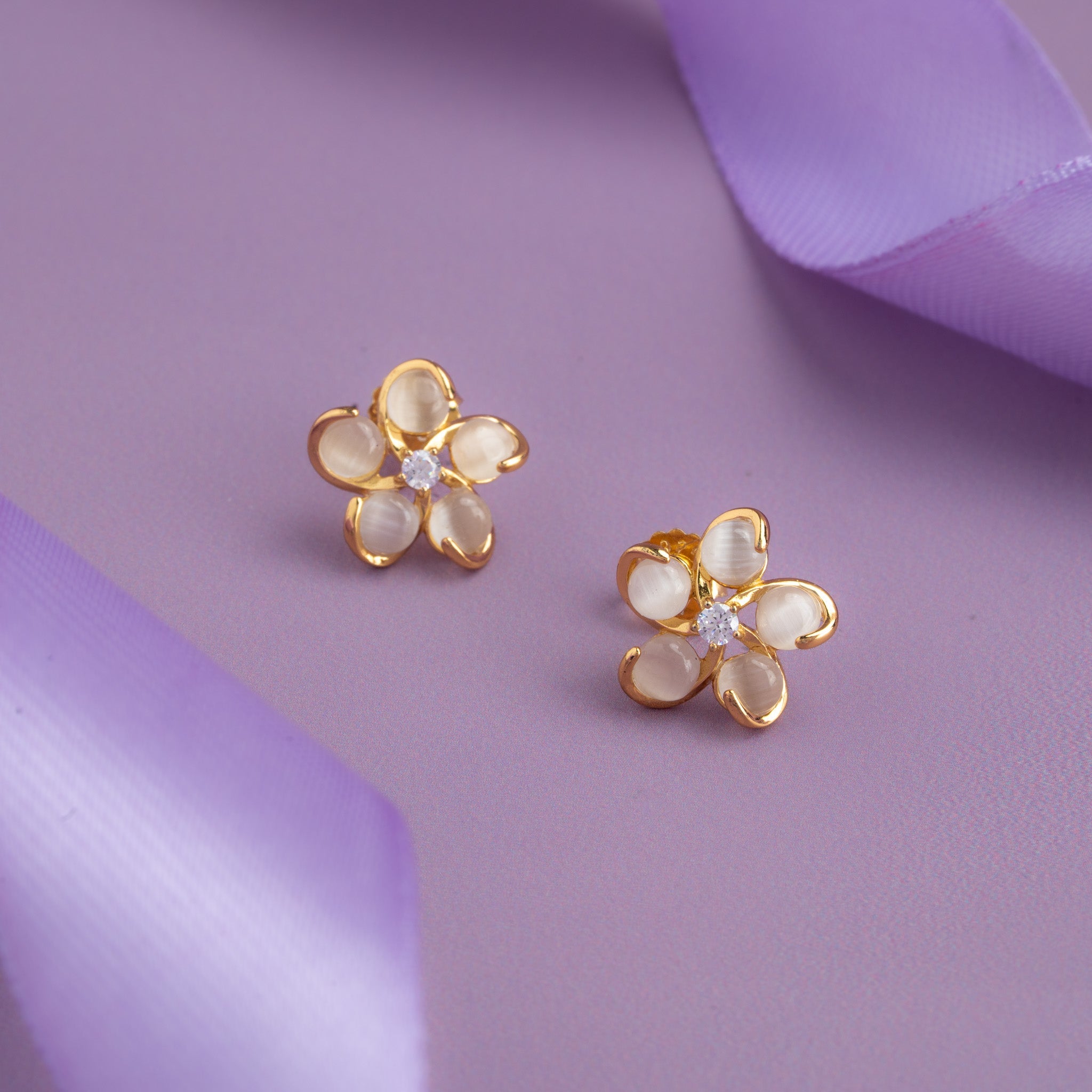 white stone petals stud